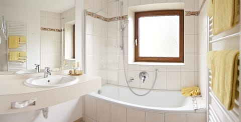 Suite, 1 Bedroom, Balcony | Bathroom | Hair dryer, bathrobes, slippers, towels