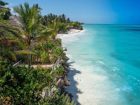On the beach, white sand, beach towels