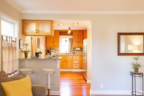 Modern open floor plan with kitchen island to enjoy your morning coffee