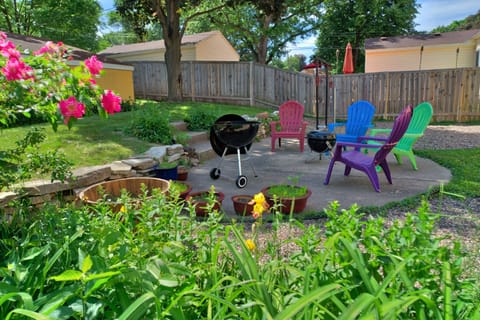 Backyard is well landscaped complete with gas BBQ and fire pit 