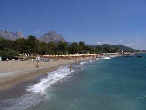 Private beach nearby, sun loungers, beach umbrellas
