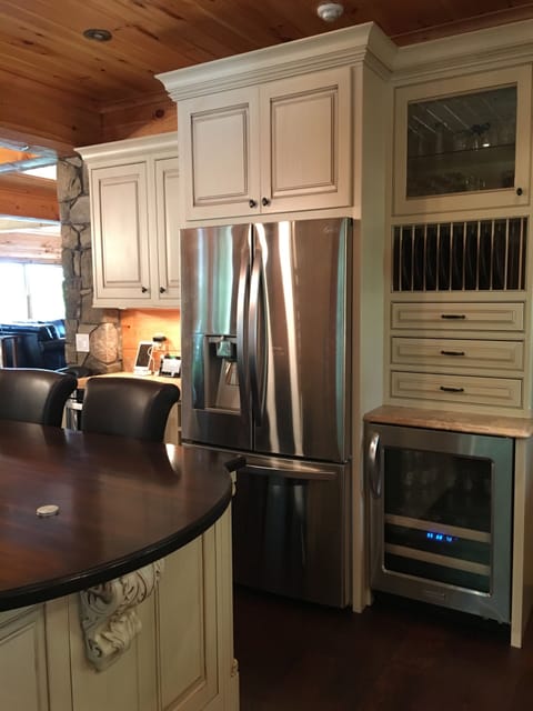 Main house kitchen microwave, fridge, and beverage elevation