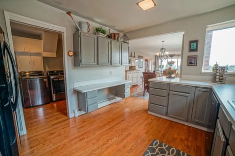 Kitchen with dining and adjacent laundry