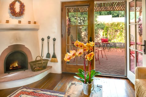 Open the doors to the patio and bring the outside in.