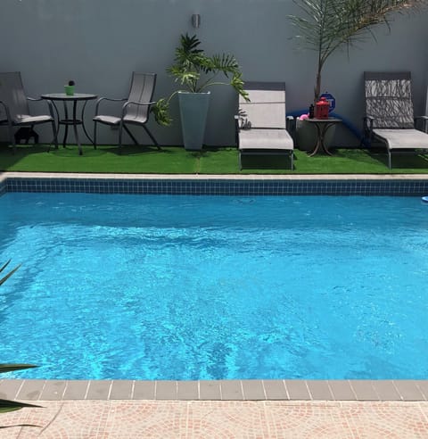 Shared pool area with next door guests (2 guests max in each suite