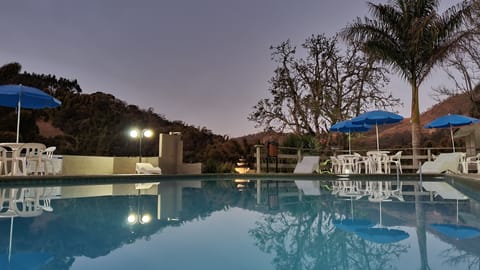 Outdoor pool, pool umbrellas, sun loungers