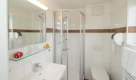 Shower, free toiletries, hair dryer, towels