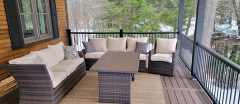 Relax under our covered deck after a great adventure.