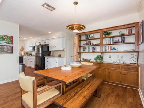 Dining area adjacent to living room. Table has been changed.