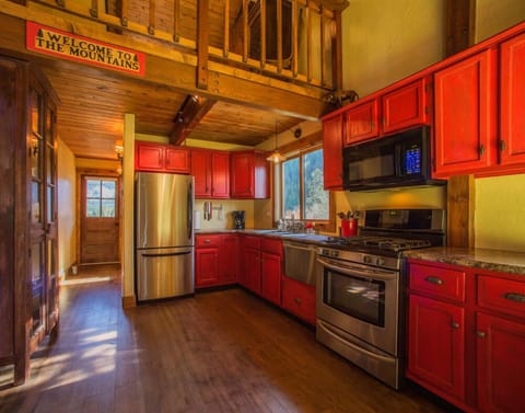 The powder pad's kitchen, featuring stainless steel appliances