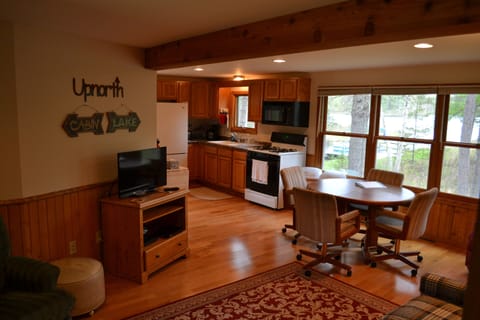 Living room looking into dining room and kitchen