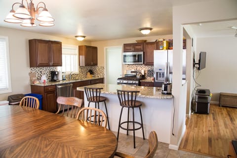 Kitchen dining room and living room are all open to each other
