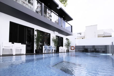 Outdoor pool, open 7:00 AM to 10:00 PM, sun loungers