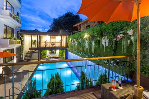 Outdoor pool, open 7:00 AM to 10:00 PM, sun loungers