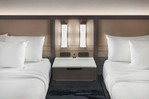 Premium bedding, desk, blackout drapes, iron/ironing board