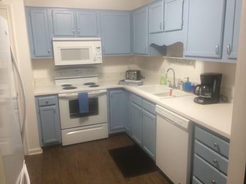 new refrigerator, new dishwasher, new counter tops, new range, new sink
