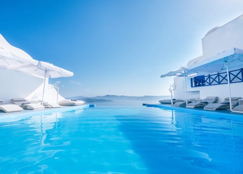 Outdoor pool, pool umbrellas, sun loungers