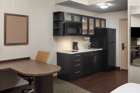 Desk, blackout drapes, iron/ironing board, free cribs/infant beds