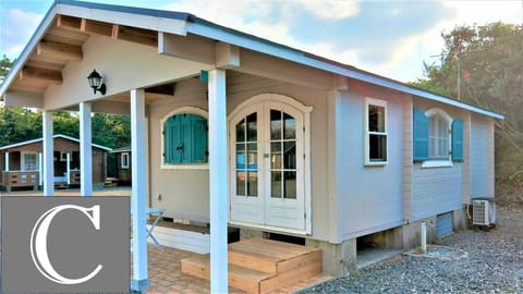 Cottage Type C | Down comforters, blackout drapes, WiFi (free), individually decorated