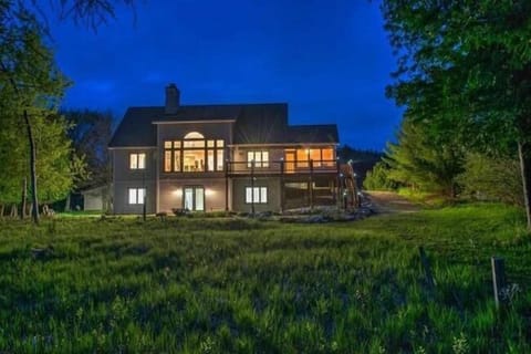 Private setting, direct lake front with private dock