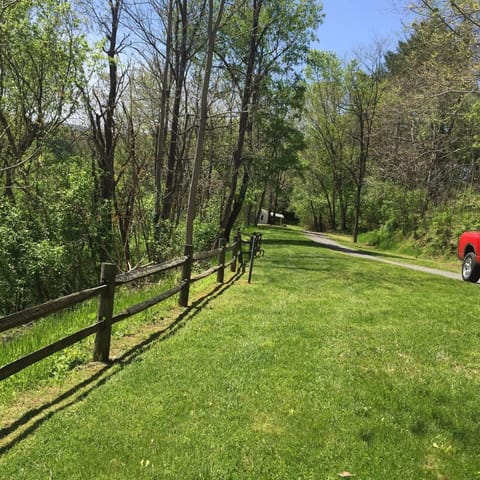 VIEW FRON FRONT PORCH DOWN DRIVEWAY...