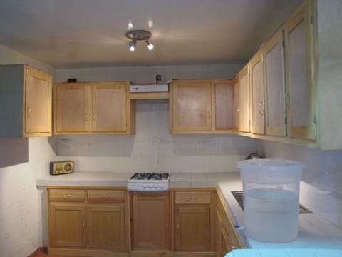 Fridge, microwave, cookware/dishes/utensils