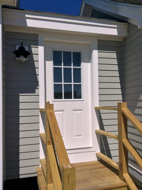 The adjacent door is where the coin-operated washer & dryer is located.