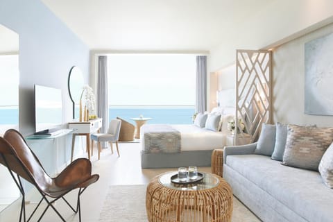 Junior Suite, Sea View | Free minibar, in-room safe, desk, soundproofing