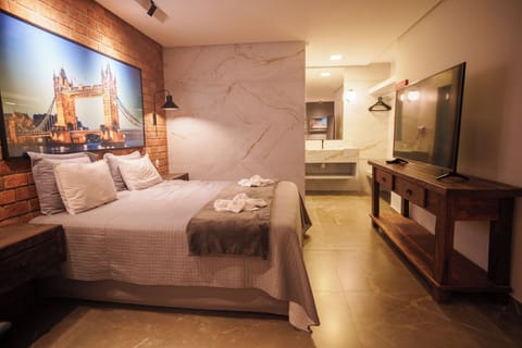 Luxury Room | Minibar, desk, laptop workspace, blackout drapes