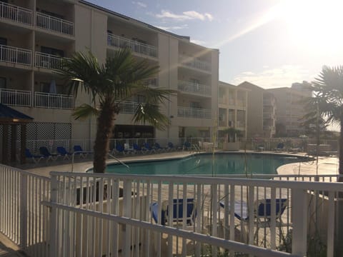 Captivating beachfront property showing 1 of 4 welcoming  pools.
