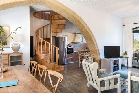 A wodden ladder that guides to the upper floor.