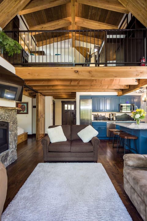 The great room of Ponderosa, with the master bedroom to the left, the kitchen to the right