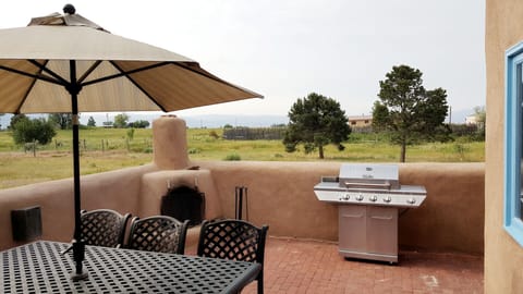 Patio off Kitchen with KIva fireplace