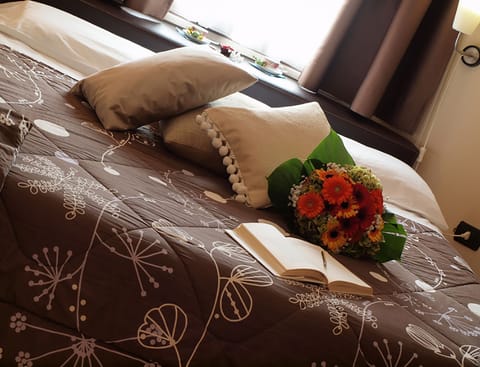 Family Quadruple Room, 1 Bedroom, Private Bathroom | Premium bedding, minibar, desk, laptop workspace