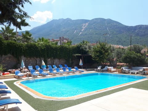 Outdoor pool, pool umbrellas, sun loungers