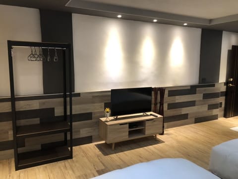 Deluxe Quadruple Room, Balcony | Down comforters, blackout drapes, soundproofing, rollaway beds