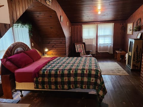 Master bedroom like no other. Roomy lakeview & all knotty pine. Walkthru video