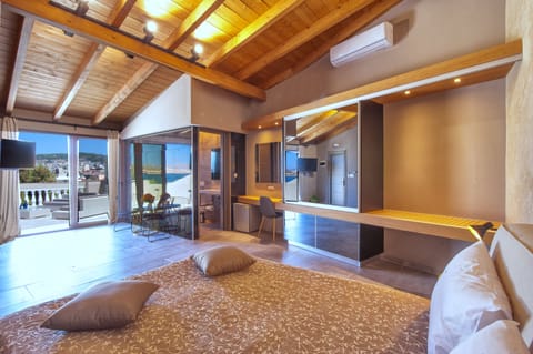 Superior Suite, Terrace, Sea View | Minibar, in-room safe, desk, soundproofing
