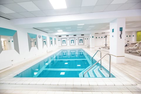 Indoor pool, open 7:30 AM to 9:00 PM, pool umbrellas, sun loungers