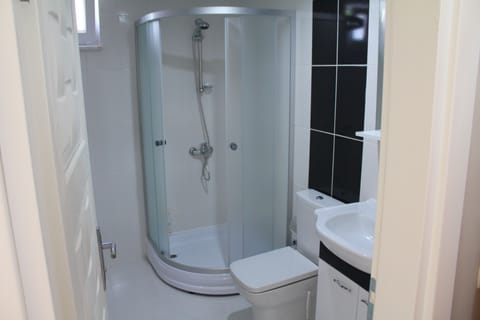 Shower, free toiletries, hair dryer, slippers