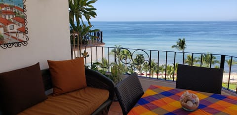 Your magnificent view from the large balcony. sounds of the beach. 