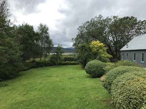 Enclosed cottage garden and view of Loch Shiel