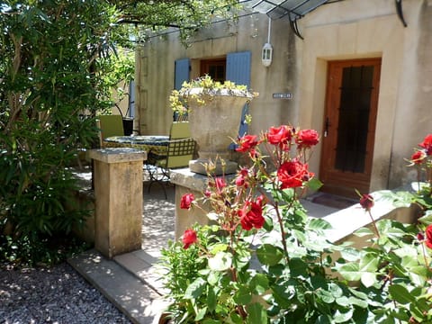 Outdoor terrace with dining table, chairs & gas bbq