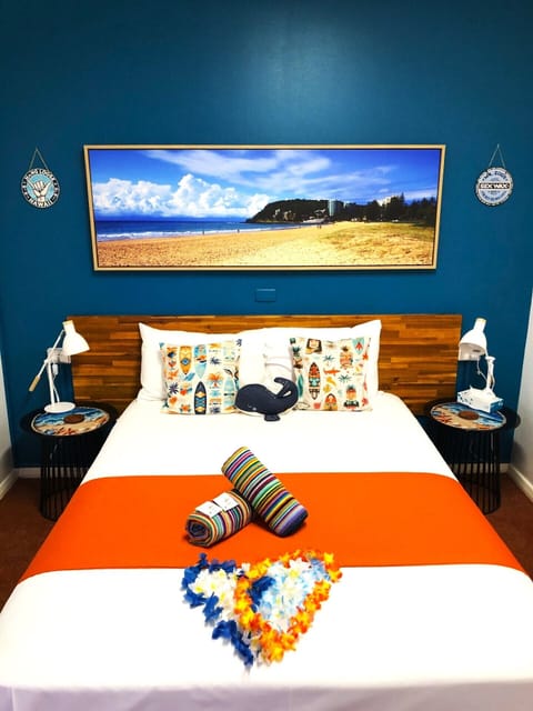 Queen Room | Premium bedding, memory foam beds, laptop workspace, blackout drapes