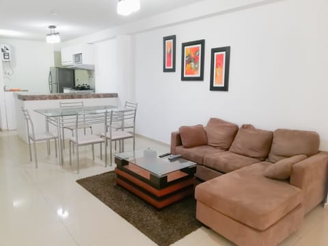 Standard Apartment, 3 Bedrooms, Kitchen | Living room | Flat-screen TV
