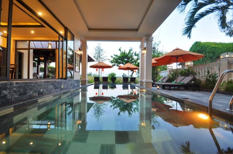 Indoor pool, outdoor pool, open 6:00 AM to 10:00 PM, sun loungers
