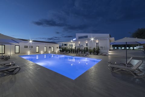 Outdoor pool, open 8:00 AM to 7:30 PM, sun loungers
