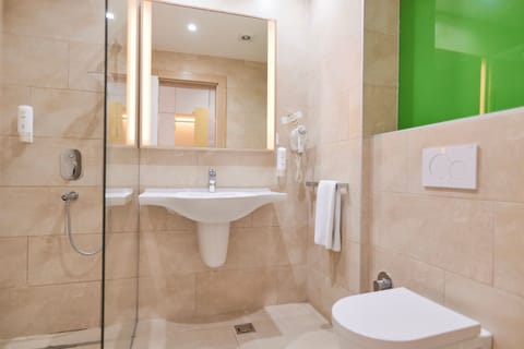 Shower, free toiletries, hair dryer, slippers