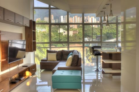 Luxury Penthouse, 3 Bedrooms, Balcony, City View | Living room | 35-inch LCD TV with cable channels, TV