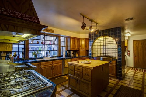 Kitchen with two refrigs, indoor BBQ, griddle, cooktop, dbl oven, and 2 sinks!